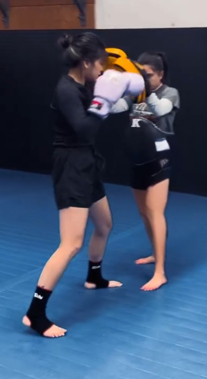 Angela training in kickboxing at the gym